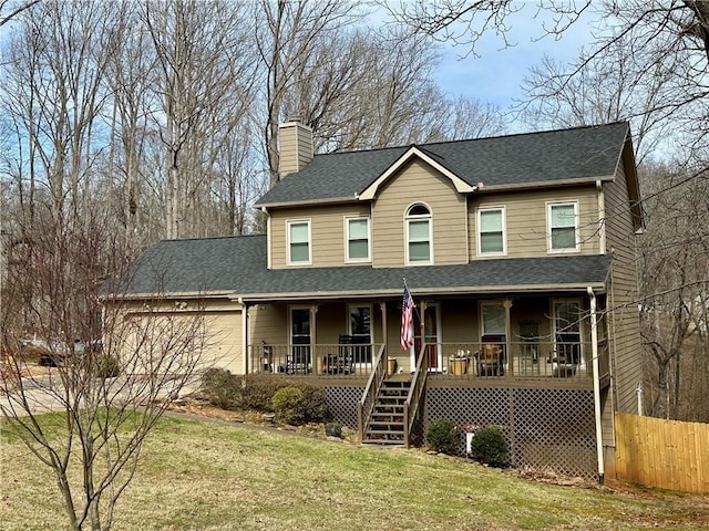 view of front facade with roof with shingles, covered porch, stairway, a front yard, and a garage