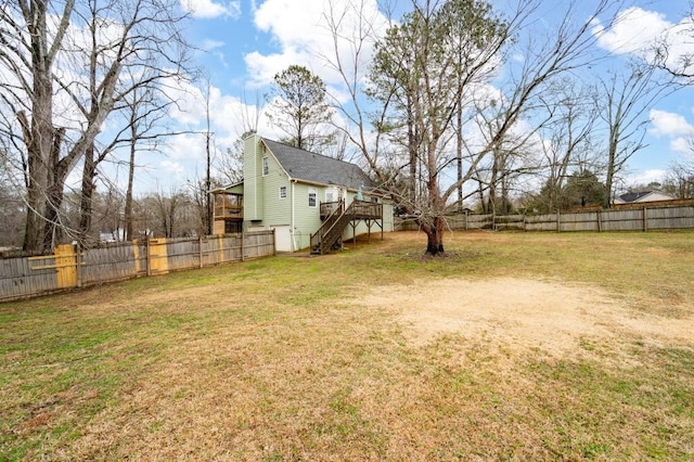 view of yard with a deck