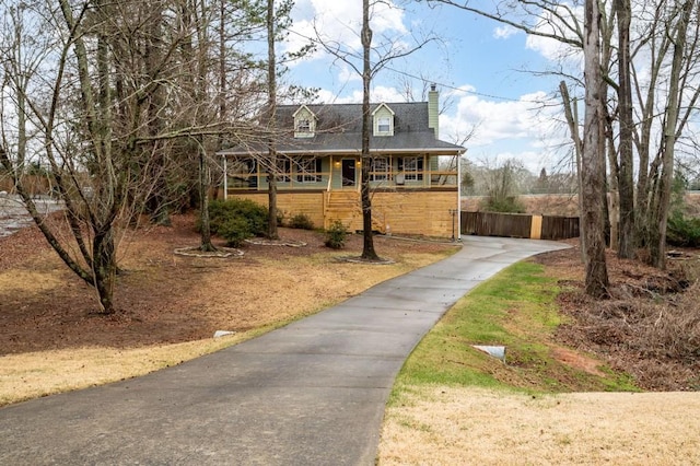 cape cod house with covered porch