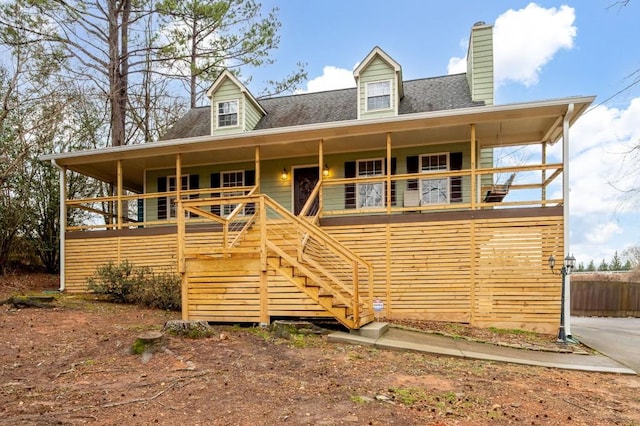 cape cod house with a porch