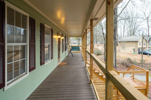 deck with covered porch