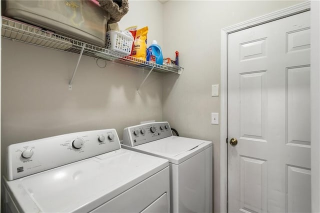 laundry area with laundry area and washer and dryer