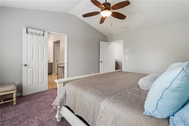 bedroom featuring visible vents, carpet, a ceiling fan, and lofted ceiling