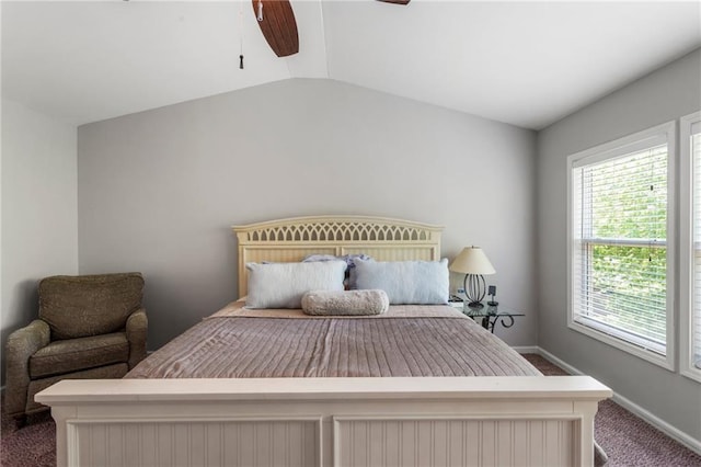bedroom featuring baseboards, lofted ceiling, ceiling fan, and carpet