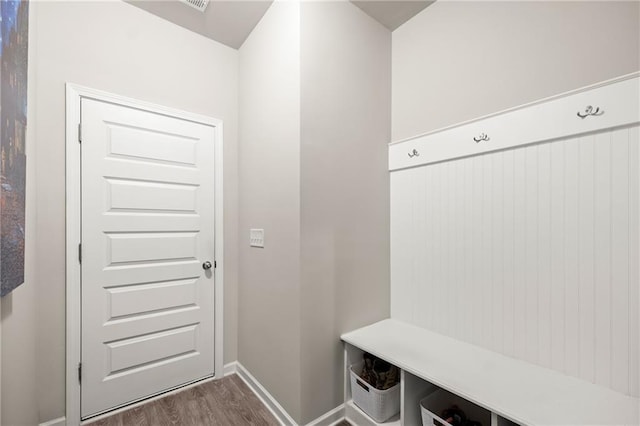 mudroom with wood-type flooring