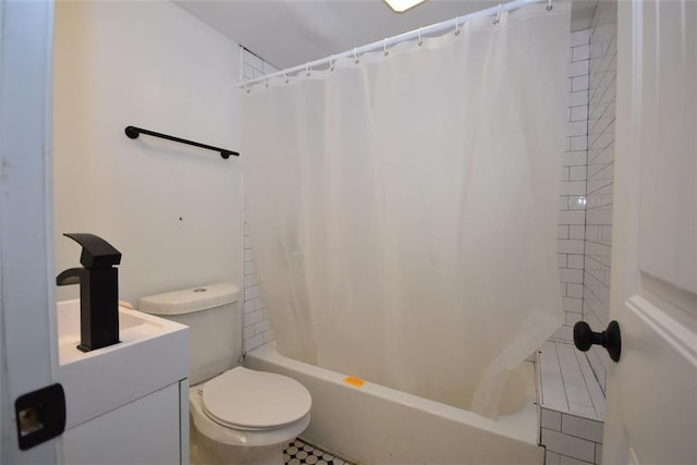 full bath with tile patterned flooring, shower / bath combo with shower curtain, and toilet