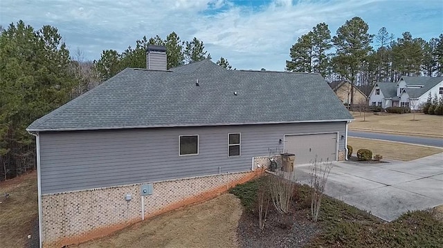 view of property exterior featuring a garage