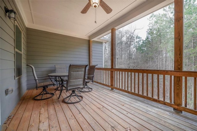 wooden terrace with ceiling fan