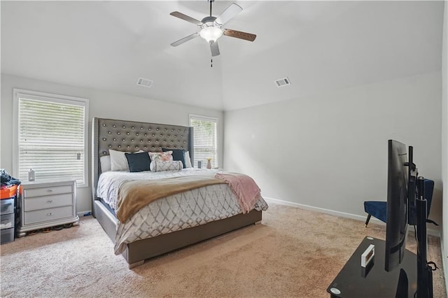 bedroom featuring carpet flooring, ceiling fan, visible vents, and vaulted ceiling