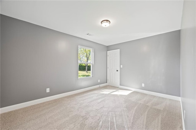 view of carpeted spare room