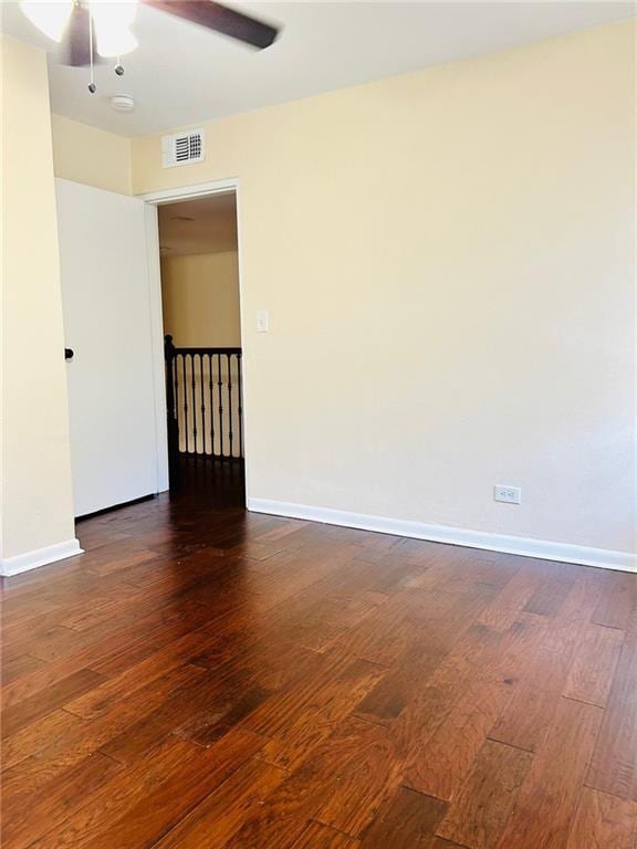 unfurnished room featuring hardwood / wood-style floors and ceiling fan