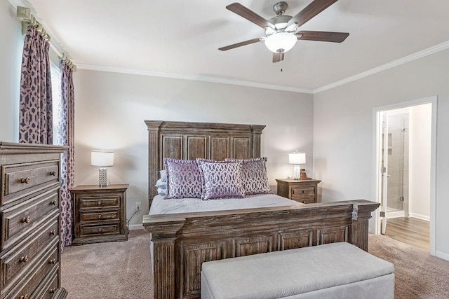bedroom with light colored carpet, baseboards, and crown molding