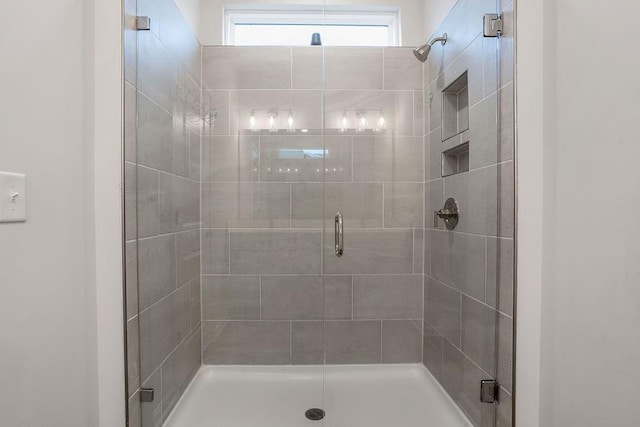 bathroom with a stall shower