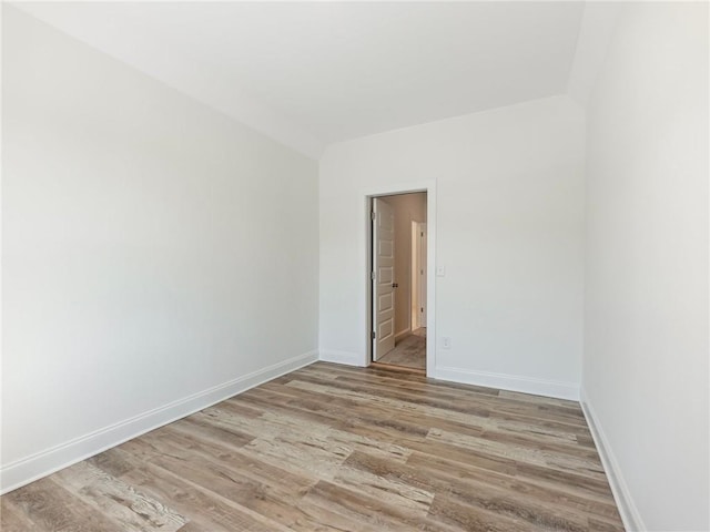 empty room with light wood-type flooring