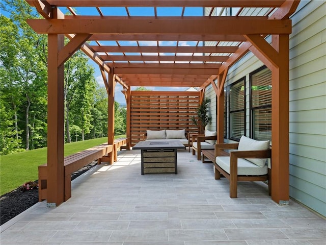 view of patio featuring an outdoor hangout area and a pergola