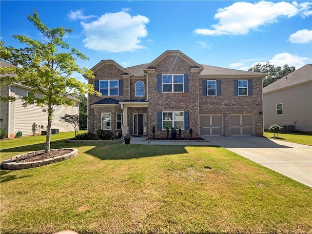 view of front facade featuring a garage, concrete driveway, central air condition unit, a front yard, and brick siding