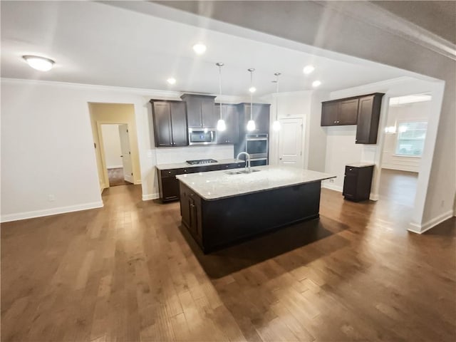 3650 Lindsy Brooke Ct, Douglasville, GA 30135 - kitchen with stainless steel appliances, crown molding, a sink, baseboards, and dark wood-style flooring