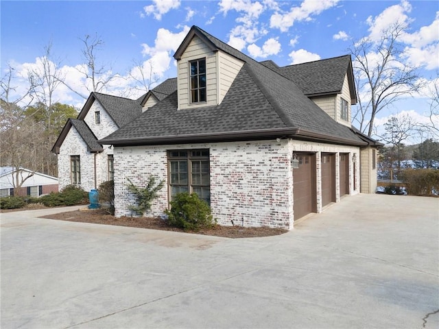 4777 Destitute Way, Gainesville, GA 30506 - view of side of home featuring driveway, roof with shingles, and brick siding