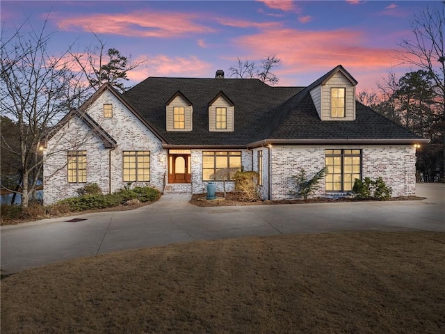 4777 Destitute Way, Gainesville, GA 30506 - french provincial home with a chimney, a shingled roof, brick siding, and concrete driveway