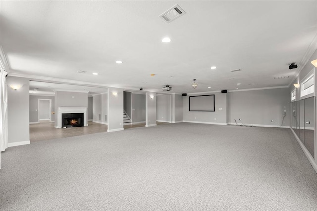 4777 Destitute Way, Gainesville, GA 30506 - unfurnished living room featuring ornamental molding, baseboards, a lit fireplace, light carpet, and recessed lighting