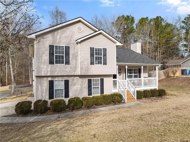 view of front of house featuring a front lawn and a porch