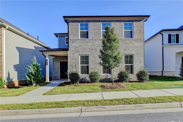 view of front of house with a front lawn