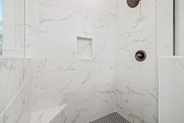 bathroom featuring plus walk in shower, crown molding, and vanity