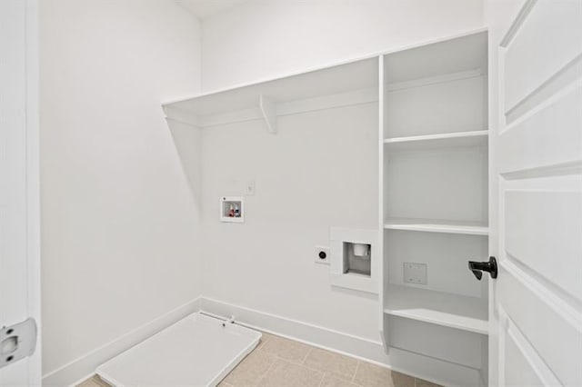 washroom featuring baseboards, laundry area, electric dryer hookup, and hookup for a washing machine