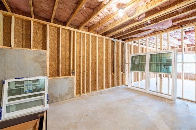 misc room with concrete flooring