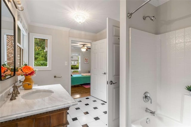 full bath featuring tile patterned floors, shower / washtub combination, vanity, ensuite bath, and ornamental molding