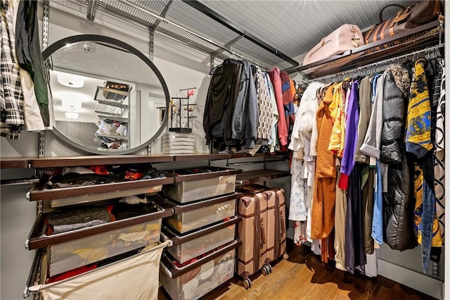 spacious closet with wood finished floors