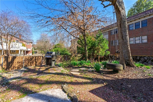 view of yard with fence