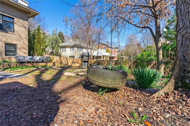 view of yard with fence