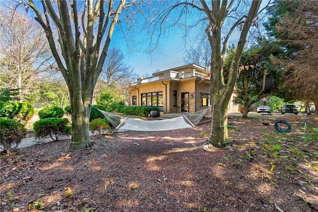 exterior space with brick siding