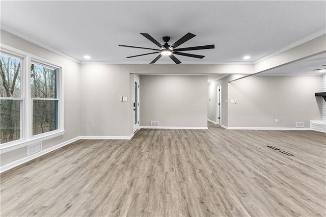 interior space featuring crown molding, light hardwood / wood-style floors, and ceiling fan