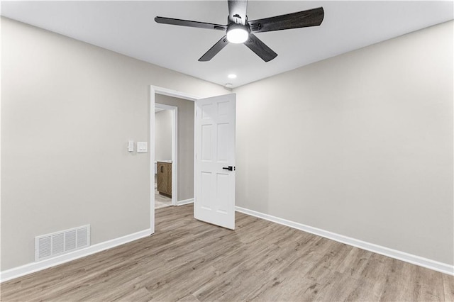 unfurnished bedroom featuring light hardwood / wood-style floors and ceiling fan