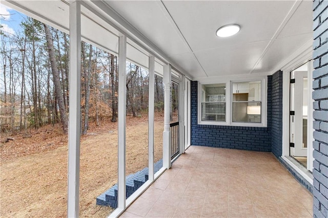 view of unfurnished sunroom