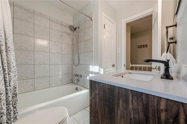 full bath with vanity, visible vents, shower / bath combination with curtain, tile patterned floors, and toilet