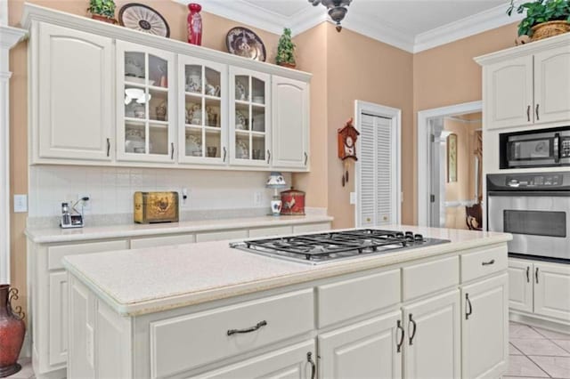 kitchen with white cabinetry and stainless steel appliances