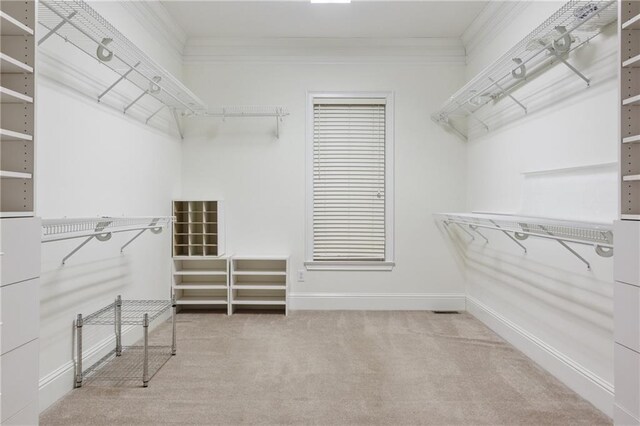 dining area with crown molding, light tile patterned floors, and decorative columns