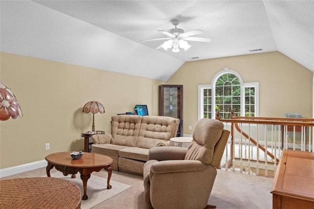 carpeted living room with lofted ceiling and ceiling fan