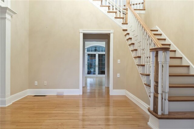 foyer with wood-type flooring