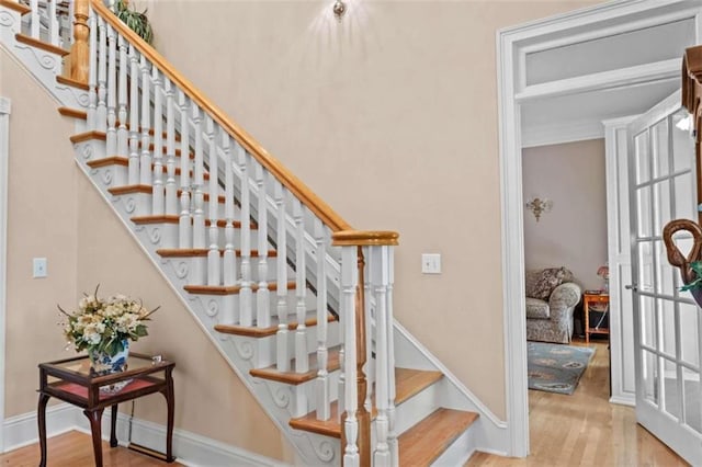 stairway with wood-type flooring