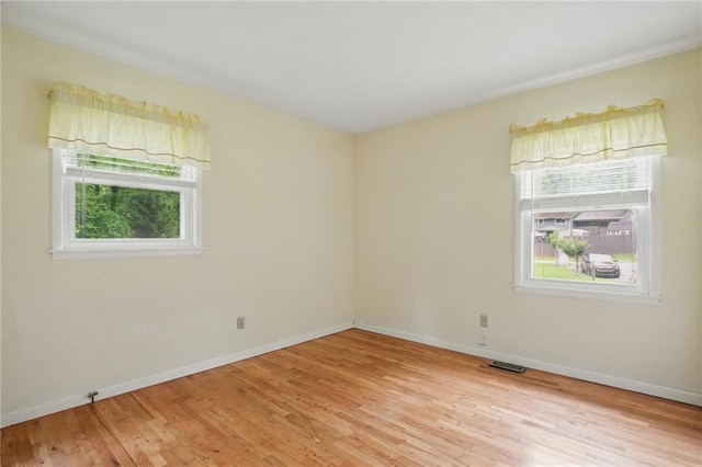 1960 Oak Leaf Ct SW, Marietta, GA 30008 - empty room featuring light wood finished floors and baseboards