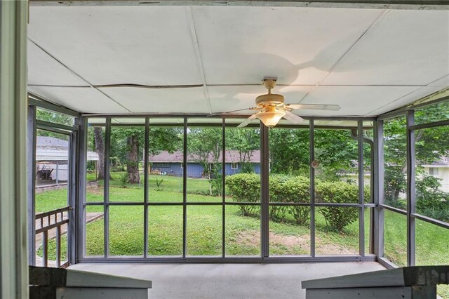 1960 Oak Leaf Ct SW, Marietta, GA 30008 - unfurnished sunroom featuring a ceiling fan
