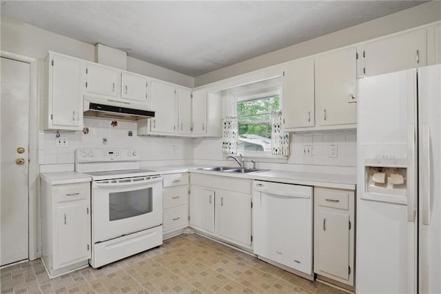 1960 Oak Leaf Ct SW, Marietta, GA 30008 - kitchen with white appliances, under cabinet range hood, a sink, light countertops, and white cabinets