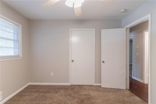 4078 Bouldercrest Rd, Ellenwood, GA 30294 - unfurnished bedroom featuring carpet flooring, ceiling fan, and baseboards