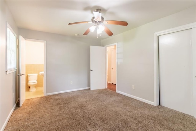4078 Bouldercrest Rd, Ellenwood, GA 30294 - unfurnished bedroom featuring carpet flooring, a closet, ensuite bath, and a ceiling fan