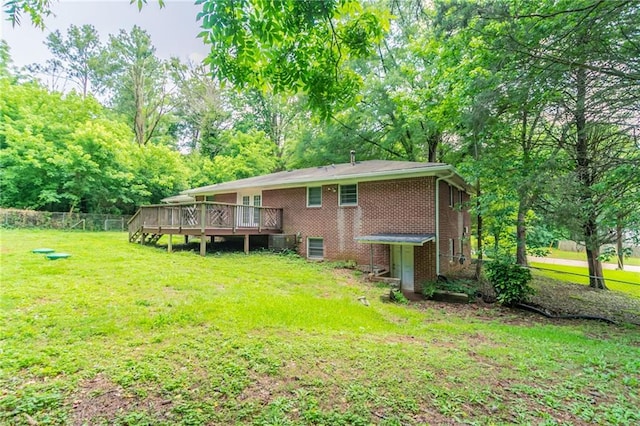 4078 Bouldercrest Rd, Ellenwood, GA 30294 - rear view of property featuring a deck and brick siding