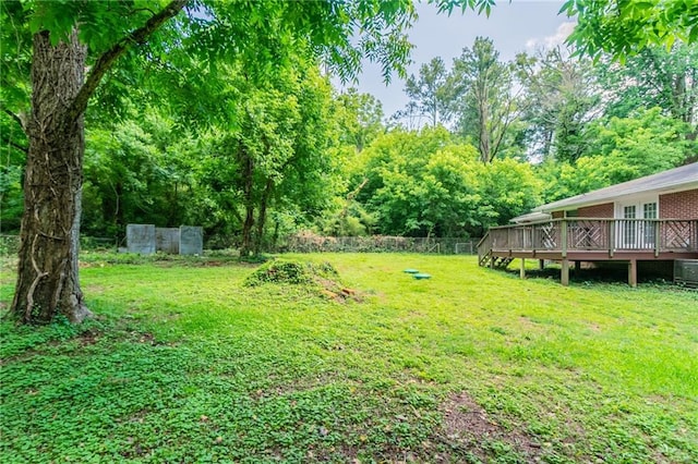 4078 Bouldercrest Rd, Ellenwood, GA 30294 - view of grassy yard featuring a wooden deck